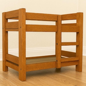May include: A small, wooden bunk bed with a warm, honey-toned finish. The miniature bed features a ladder and a lower level, perfect for a pet or a child's doll. The design is simple and sturdy, with visible wood grain.