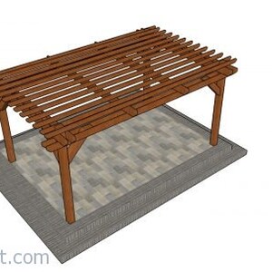 May include: A brown wooden pergola with a slatted roof, supported by four sturdy posts. The structure is set on a gray stone patio, offering a shaded outdoor space. The design is simple and functional.