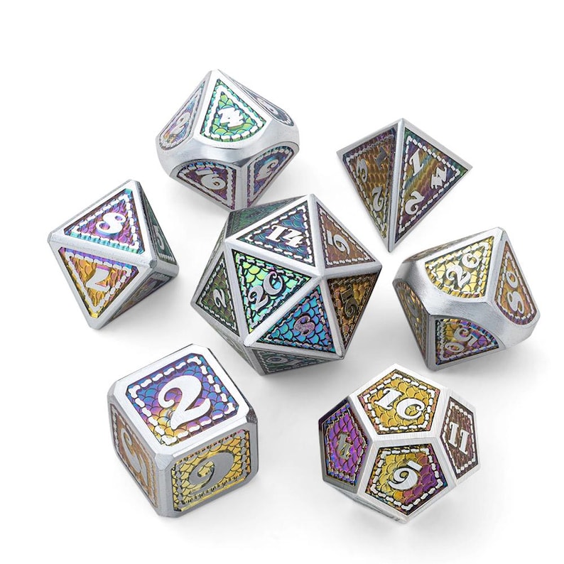 May include: Set of seven iridescent metal dice with a dragon scale design and white numbers. The dice are in various positions on a white background.