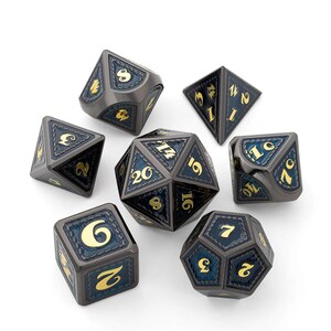 May include: A set of seven black and blue metal dice with gold numbers. The dice are in various shapes, including a d20, d12, d10, d8, d6, d4, and a d%.