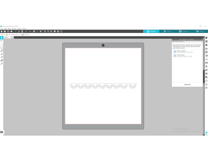 May include: A computer screen displaying a design program with a white background and a gray border. The design program shows a white scalloped border at the bottom of the screen.
