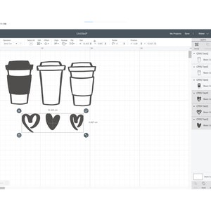 May include: Three black and white coffee cups with a heart design below them. The cups are 3.847 inches tall and 12.423 inches wide.