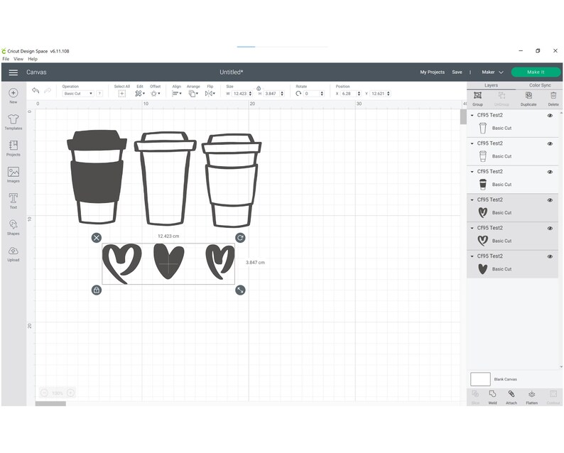 May include: Three black and white coffee cups with a heart design below them. The cups are 3.847 inches tall and 12.423 inches wide.