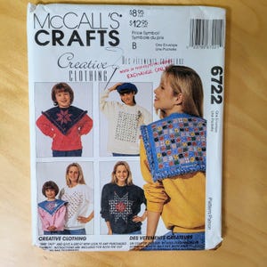 May include: McCall's Crafts sewing pattern envelope featuring Creative Clothing designs. The envelope displays images of various tops with decorative elements. The price is $8.95.