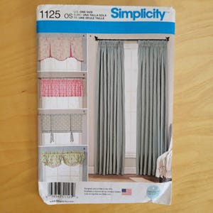 May include: Simplicity sewing pattern 1125 for window treatments. The envelope displays illustrations of four different valance styles and a pair of full-length pleated curtains in a solid light gray color. The text includes the brand name Simplicity.