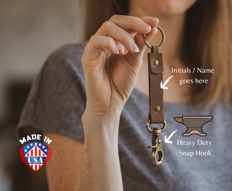 May include: Brown leather keychain with a heavy duty snap hook and a space for initials or a name. Made in the USA.