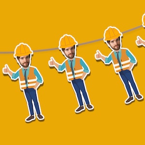 May include: A string of four yellow construction worker figures with smiling faces, wearing hard hats and safety vests, with thumbs up. The figures are hanging from a string.