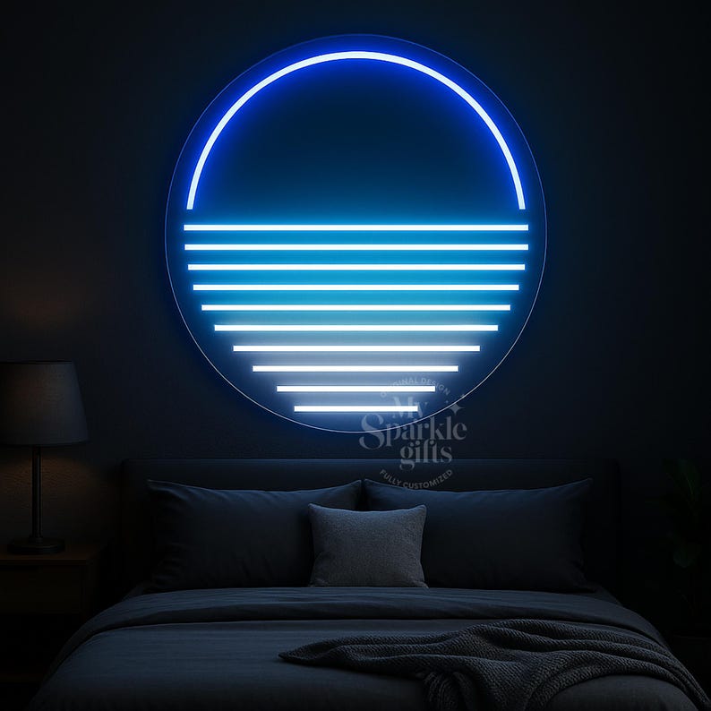 May include: A circular neon wall light featuring a glowing blue outline and a series of horizontal white lines that decrease in length toward the bottom. The design resembles a sunset over water. The text My Sparkle Gifts is visible.