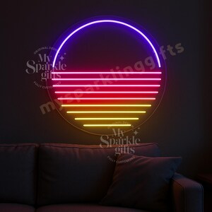 May include: A circular neon wall sign featuring a gradient sunset design with a purple arc at the top, followed by horizontal lines in shades of pink, orange, and yellow. The text My Sparkle Gifts is visible in the center and around the sign.