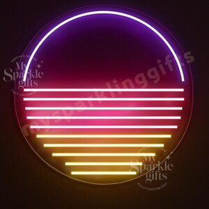 May include: A circular neon sign featuring a gradient sunset design. The top arc is purple, transitioning into horizontal lines of pink and yellow light. The text My Sparkle Gifts is visible in the upper left and lower right corners of the sign.