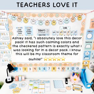 May include: A classroom decor set featuring a pastel checkered and smiley face theme. The display includes a banner, a calendar, number line, and desk accessories like a flower-shaped pen holder, all in soft blue, peach, and yellow colour tones.