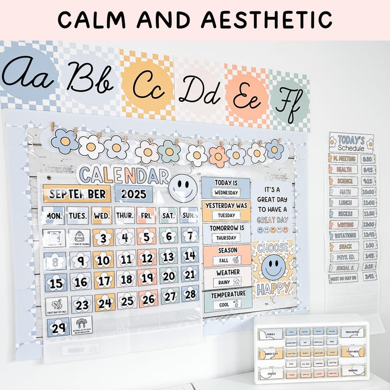May include: A classroom calendar set featuring a pastel colour palette with checkerboard patterns, floral accents, and smiley faces. The display includes an alphabet banner, a September 2025 calendar, a daily schedule, and a small organiser with labels.