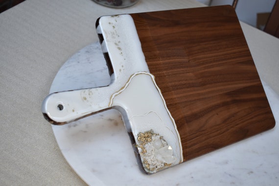 Large walut cutting board with resin covered handle