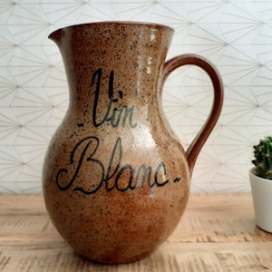 Vintage enameled stoneware pitcher