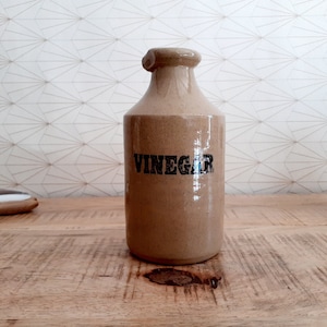 Pretty vintage vinegar bottle in enameled stoneware
