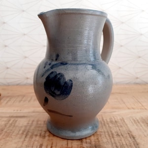 Vintage enameled stoneware pitcher