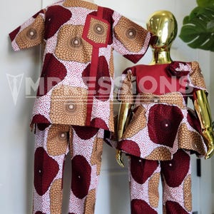 May include: A matching set of children's clothing featuring a red and white fabric with a brown floral pattern. The set includes a short-sleeved shirt and trousers for a boy and a short-sleeved top and trousers for a girl.