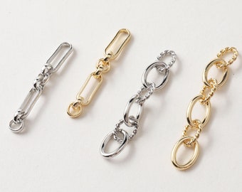 May include: Four different chain links in silver and gold. The chains are all different styles, with some being thicker and some being thinner. The chains are all about the same length.