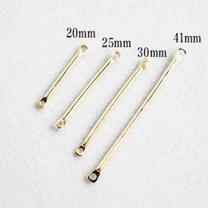 May include: Four gold-coloured metal connector bars with loops at each end. The bars are arranged in order of increasing length, with the shortest bar measuring 20mm, the next 25mm, then 30mm, and the longest 41mm.