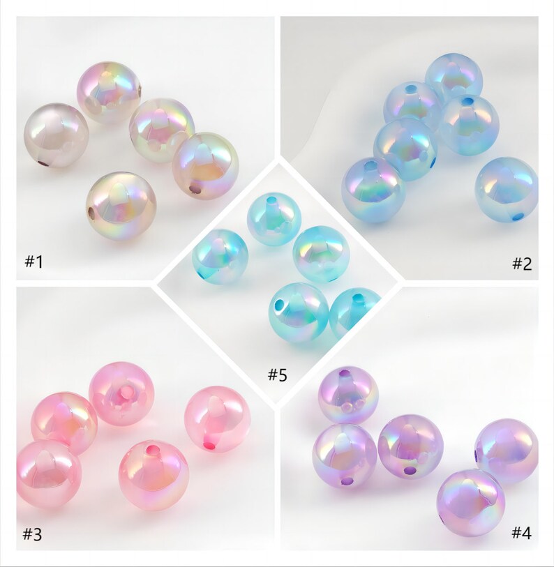 May include: Assortment of iridescent glass beads in various colors, including white, blue, pink, and purple. The beads are round and have a smooth, shiny finish.