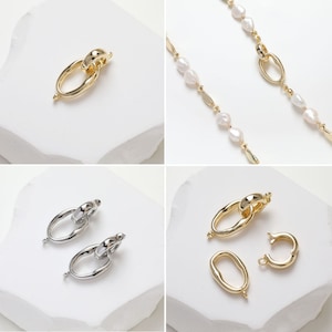 May include: Two gold and two silver oval-shaped connector clasps for jewelry making. The clasps have a unique twisted design and are perfect for adding a touch of elegance to necklaces, bracelets, or anklets.