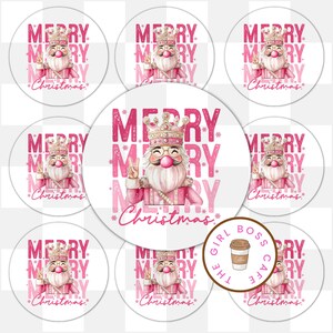 May include: A set of circular stickers with a pink illustration of a Santa Claus-like character wearing a crown and glasses, with the words "MERRY CHRISTMAS" in pink. The stickers are on a white background.