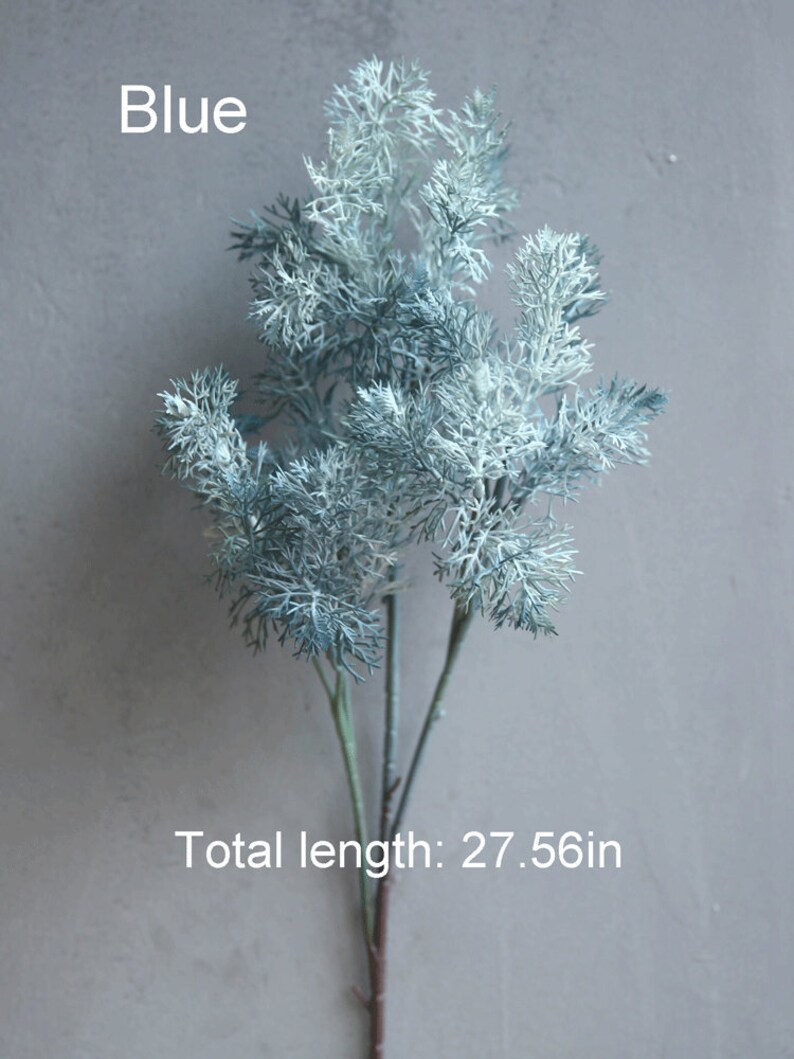 May include: A blue artificial plant sprig with feathery leaves. The sprig is 27.56 inches long.