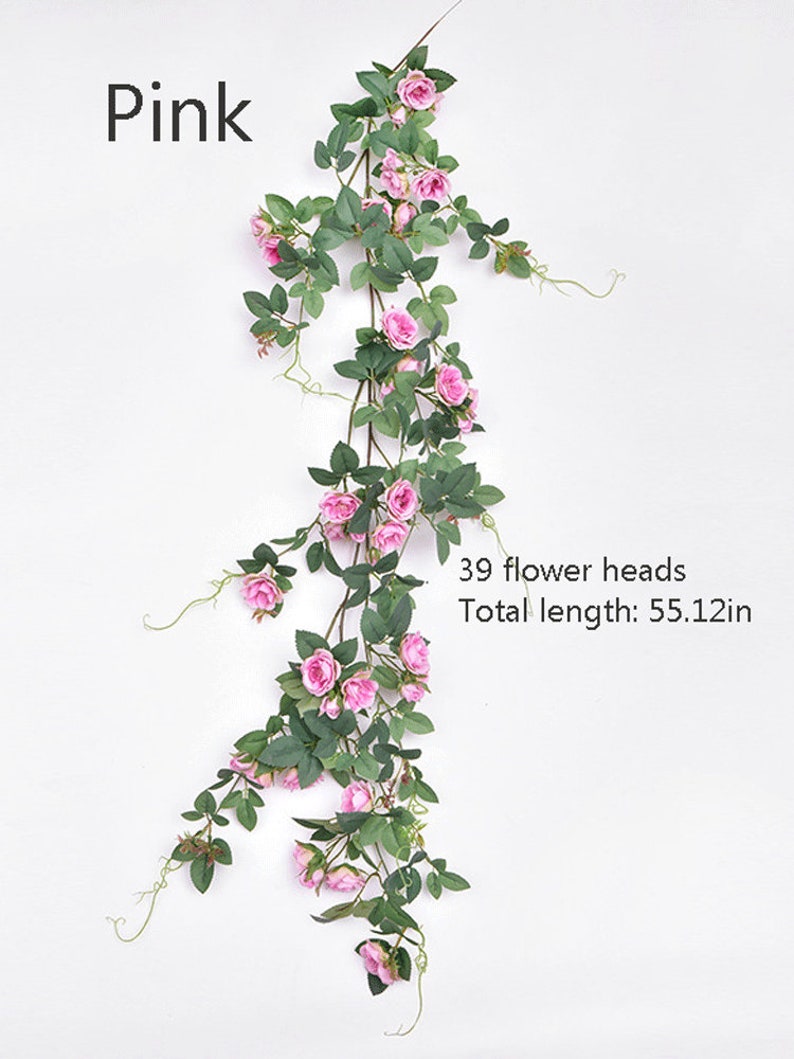 Puede incluir: Una vid artificial de rosas rosas con 39 cabezas de flores y una longitud total de 140 cm.
