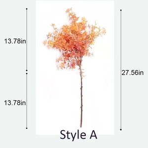 以下が含まれることがあります： オレンジと赤の葉を持つ人工の葉の単一の茎。茎は約70cmの高さで、葉は約35cmの幅です。茎には「スタイルA」とラベル付けされています。