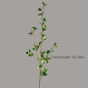 May include: A single artificial green plant stem with brown branches and small leaves. The stem is approximately 41.34 inches long.  Total length: 41.34in