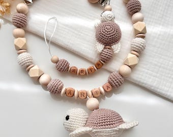 Conjunto personalizado de cadena para cochecito y cadena para chupete con nombre, perfecto como regalo de nacimiento o para baby shower.