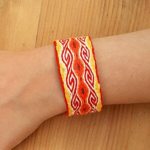 Bracelet Kivrim double orangé, tissage aux tablettes, en lin , tissé à la main