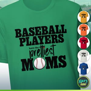 May include: Green t-shirt with the text "Baseball Players have the prettiest Moms" in black with a red heart and a baseball graphic.