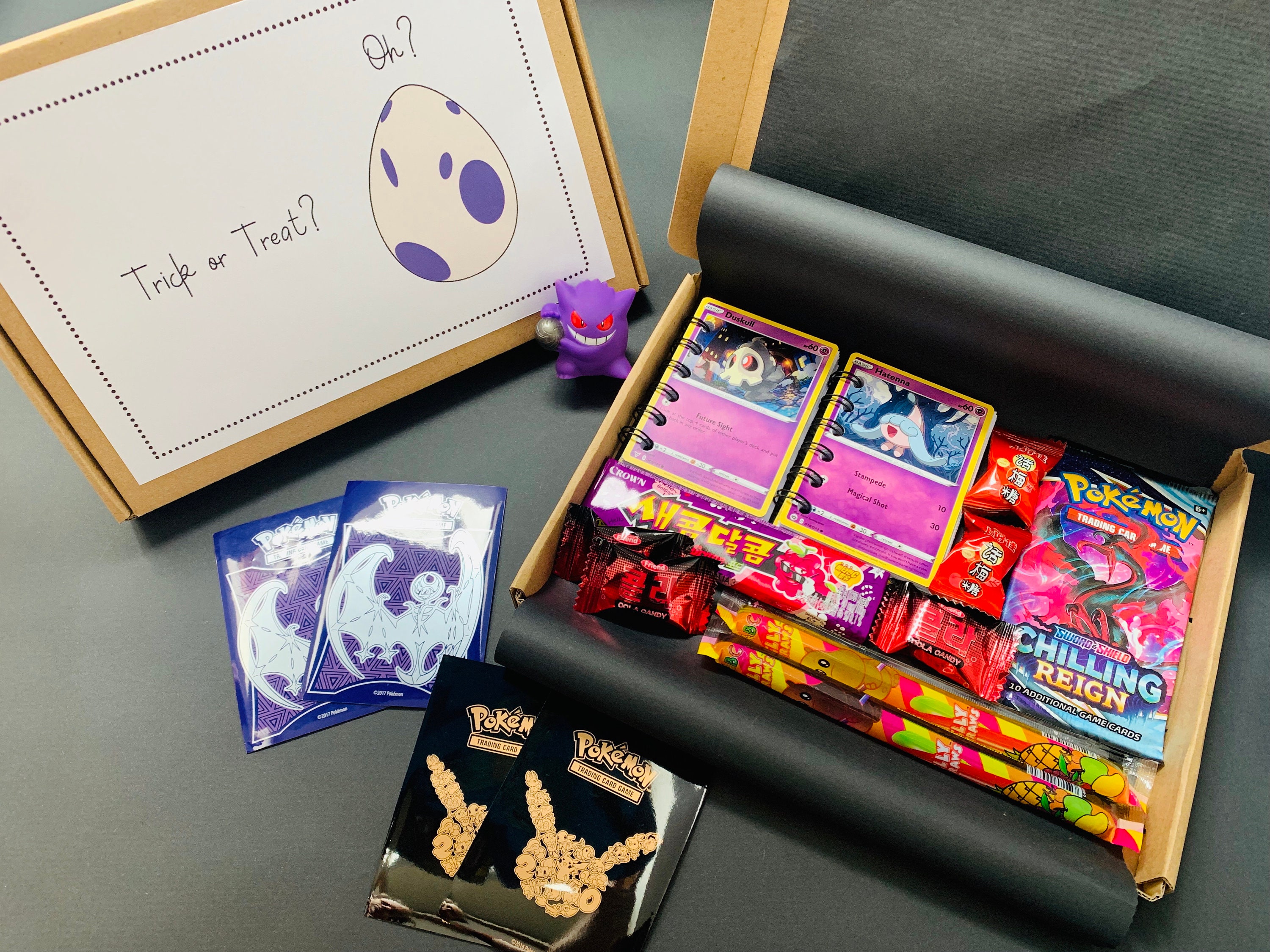 Pokémon Trick or Treat Gift Box includes a pack of cards Etsy