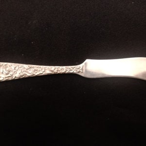 S.Kirk and Son Repousse Sterling Silver Butter Spreader.