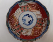 Japanese Imari Porcelain Bowl with Bird and Tree Design.