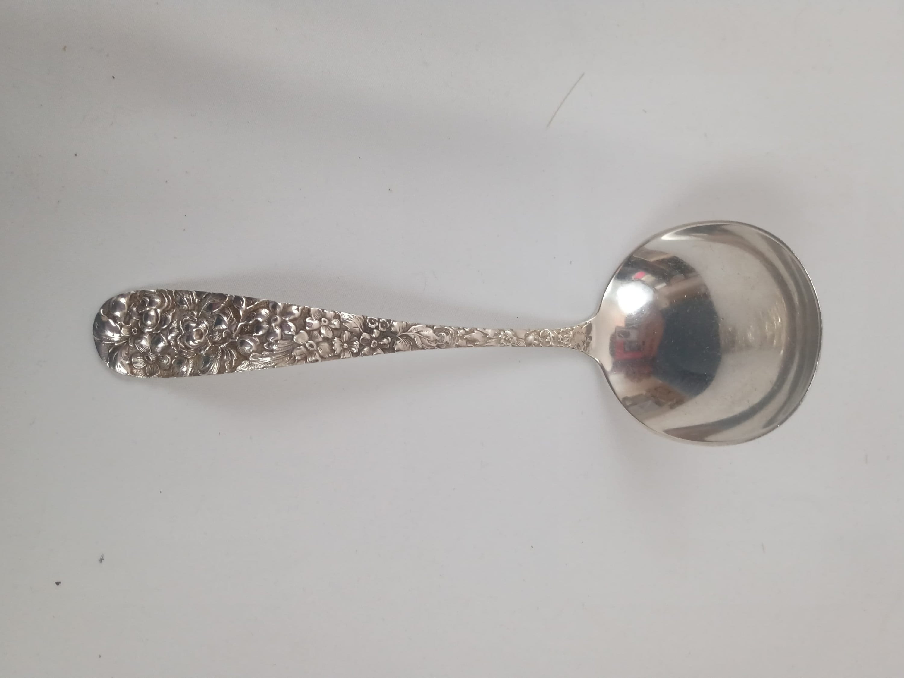 20th Century Stieff Sterling Silver Repousse Rose Cream Ladle.