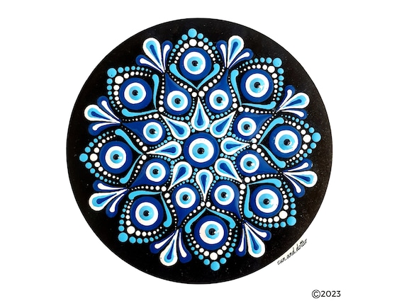 How to make a dot mandala painting with swooshes and swipes with