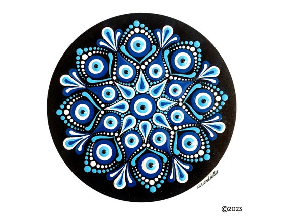 How to make a dot mandala painting with swooshes and swipes with