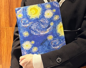 May include: A blue and yellow notebook cover with a swirling, starry night design. The cover is made of a durable material and features a classic art print.