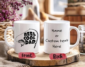 Tazza da caffè con grafica "Reel Cool Dad" e canna da pesca.