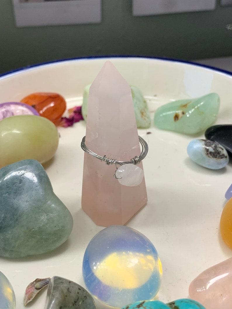 Silver wire ring with pink gem