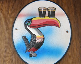 Cast Iron Toucan Guinness Plaque: Colorful Beer Decor