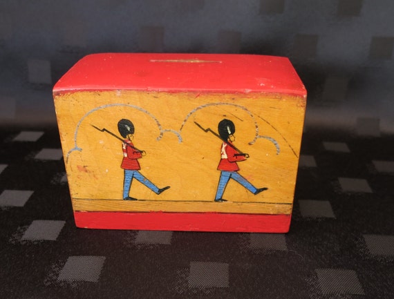 Vintage Child's Wooden Money Box with Soldiers around the side