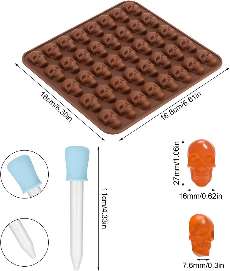 May include: A brown silicone mold with 48 skull-shaped cavities. The mold measures 6.3 inches by 6.6 inches. Two clear droppers with blue tops are shown. Two orange skull-shaped candies are shown, one measuring 0.62 inches wide and the other measuring 0.3 inches wide.