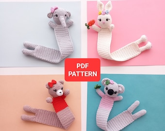 May include: Four crocheted animal bookmarks, each with a different animal: an elephant, a bunny, a bear, and a koala. The bookmarks are all gray with different colored accents. The bookmarks are on a white background with colored squares behind each one. The text "PDF PATTERN" is in red on a white background.