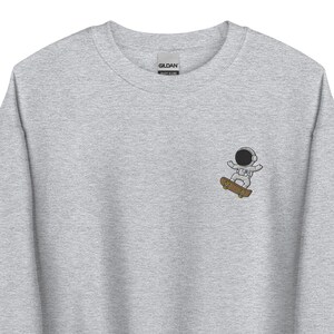 Astronaut Skateboarder Embroidered Sweatshirt Gift, Space Gifts, Unisex Crewneck Sweater, Long Sleeve Pullover Sweater - Multiple Colors