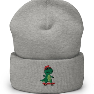Dino Skater Beanie, Dinosaur on Skateboard Embroidered Beanie, Cute Dino Beanie, Unisex Cuffed Beanie, Winter Gift Hat - Multiple Colors