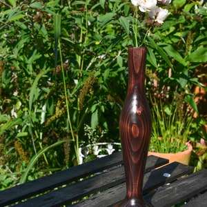 flower vase made of stained spruce wood