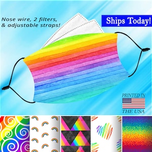 May include: A rainbow striped face mask with adjustable straps, nose wire, and two filters. The mask is printed with a watercolor effect. The text "Ships Today!" and "Printed in the USA" is visible in the image.
